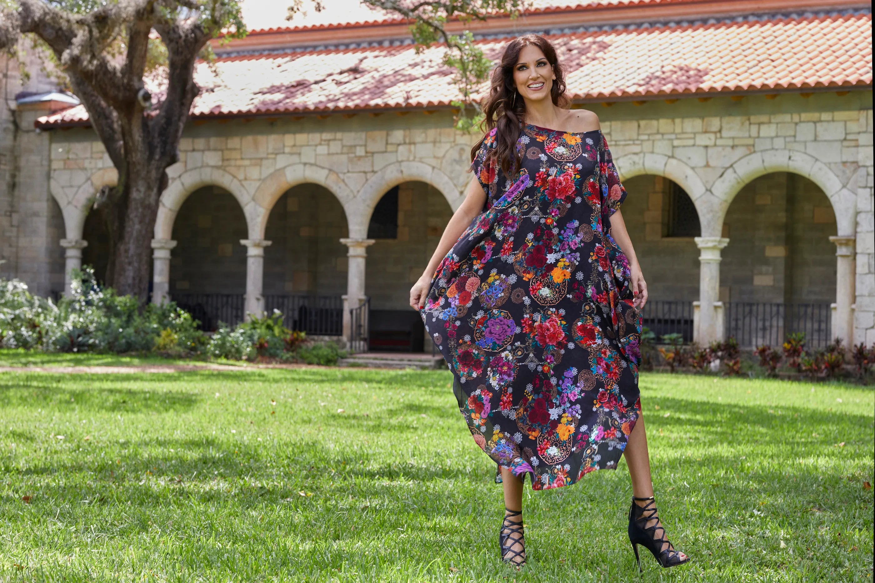 Kim Cáceres wearing a luxury silk kaftan dress in Sicilian Sigh print